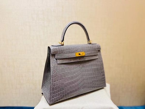 

real grey shinny crocodile leather,designers handbag 25cm,fully handmade quality,wax stitching,by order only dont have in stock,can make oth