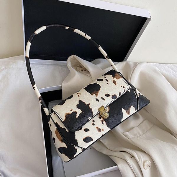

cow pattern ladies shoulder bag pu soft leather fashionable and cute underarm bag ladder shape handbag dot printed purse