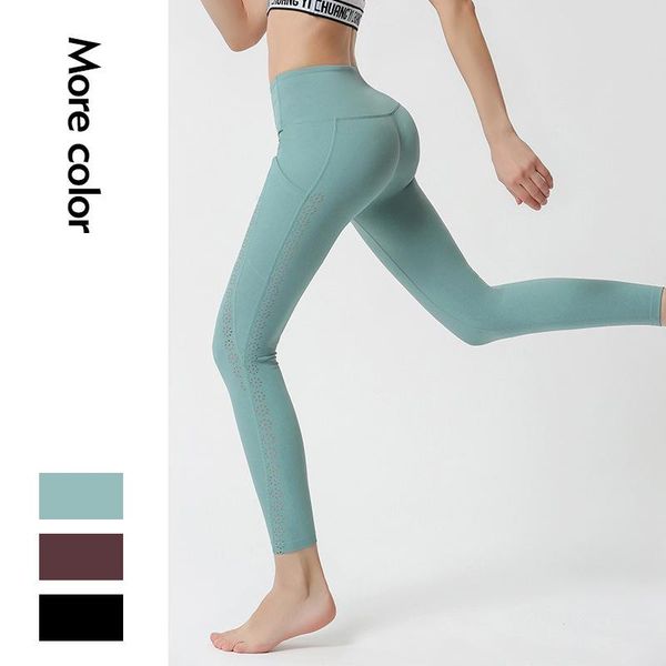 

yoga outfit nylon nude side pocket pants female hollow stitching hip-lifting sports running fitness workout leggings