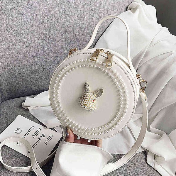 

foreign style small bag female 2021 fashion korean versatile menger high level feeling net red pearl round