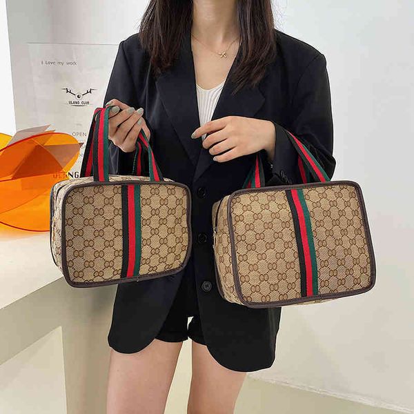 

2022 factory wholesale handbag small carry small simple canvas portable cosmetic