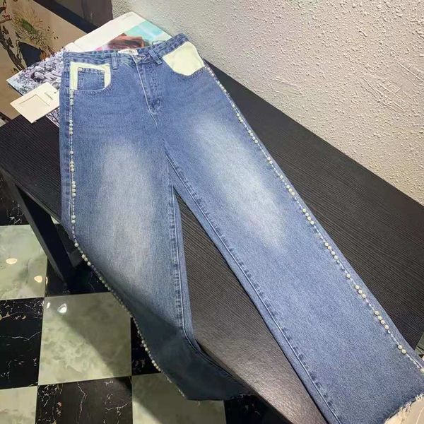 

ch * el is sewn with pearl decoration on both sides, and the straight pants are thin do not pick a figure, Blue