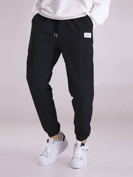 

men letter patched drawstring waist tapered pants l36x#, Black