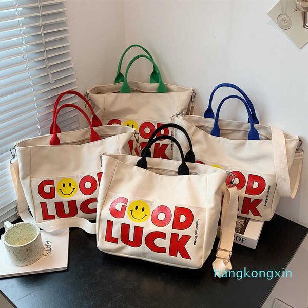 

handbags s 2021 korean dongdamen portable smiley face letter canvas tote women's leisure simple large capacity mommy