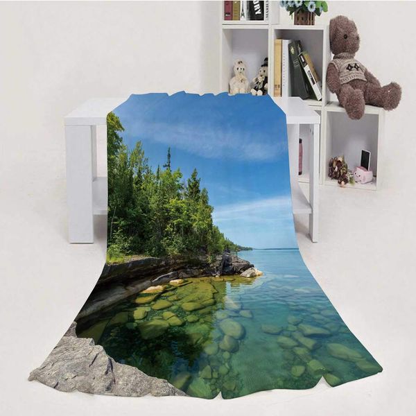 

the clear waters of lake superior reveal large rocks and stones underwater.this cove,soft luxuries throw blanket microfiber soft