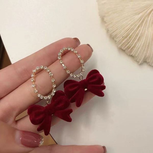 

autumn winter red earrings temperament flocking earrings simple oval inlaid plush