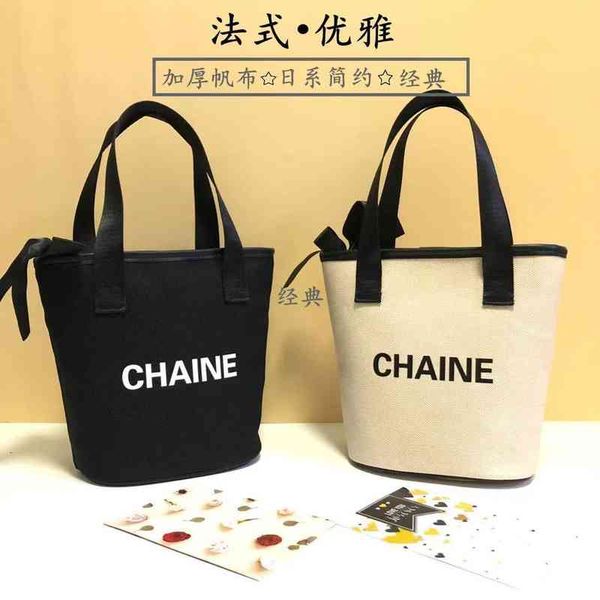 

cosmetic bags handbags simple small fragrance bow bucket with letters elegant shopping handbag black and white french storage