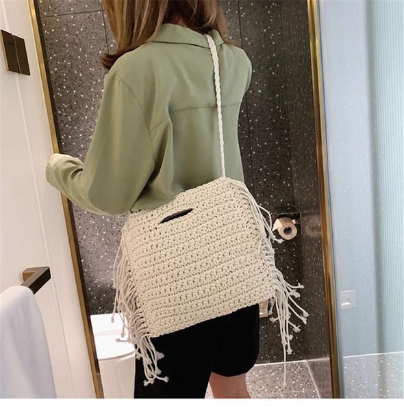 

cotton woven hand held fringed beach straw bag digner holiday handbags for women 2021