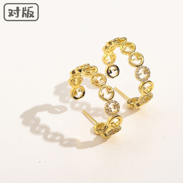 

charms earrings french ancient family double g exaerated bi earrins copper inlaid zircon real gold plated temperament letter, Golden