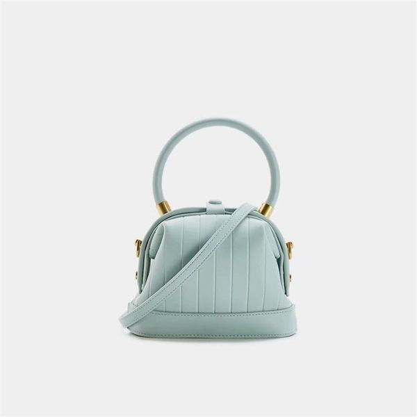 

ur doctor female 2021 new niche temperament women's versatile handbag clip one shoulder slanting shell bag