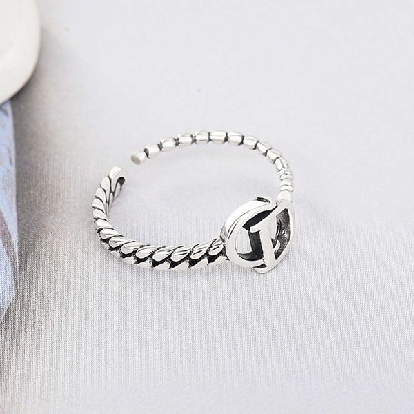 

S925 Sterling Silver Open women's new asymmetric ring used CD initials, Black