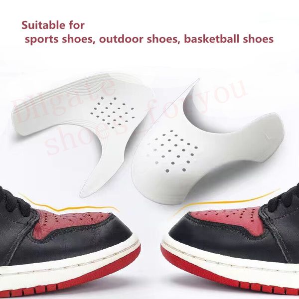 

shoes shields for sneaker anti crease wrinkled fold shoe support toe cap sport ball shoe head stretcher shoes trees white black yellow grey, White;pink