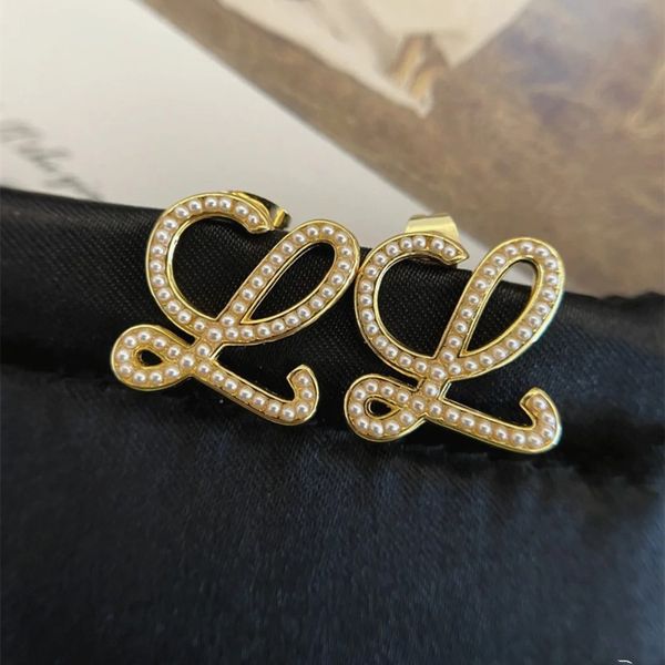 

s925 silver needle luojia golden pearl curve earrings fashion personality geometric abstract