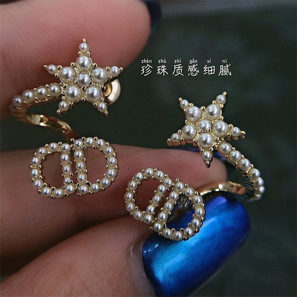 

2021 new designer millet pearl design stud earrings for women, Golden