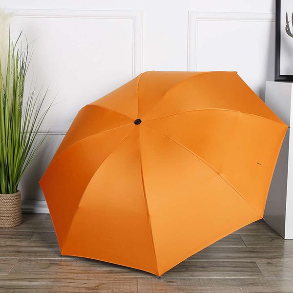 

8 bone black glue reverse folding sunny umbrella orange three fold advertising gift