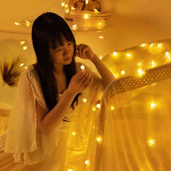 

red girl's room is decorated with stars all over the sky