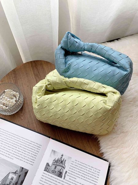 

venetas bottega woven leather knotting hand held high sense of foreign temperament yellow wrinkled cloud bag designer handbag wan