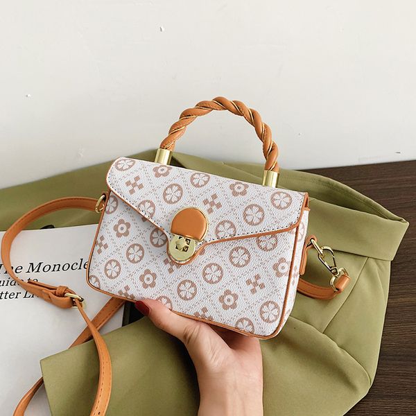 

ins fashion women's 2021 summer new texture shoulder flower pattern hand messenger bag