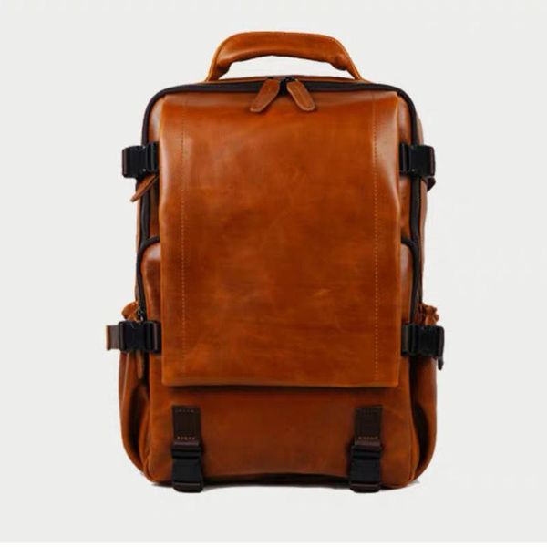

backpack tilorraine 2021 retro leather personality capacity schoolbag men trend solid color business computer shoulder bag