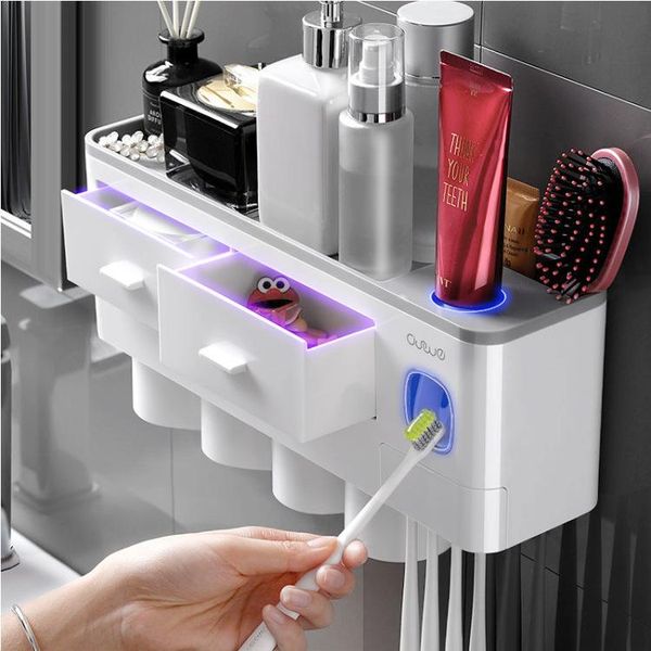 

toothbrush holders -selling wall-mounted non-perforation cup shelf bathroom holder