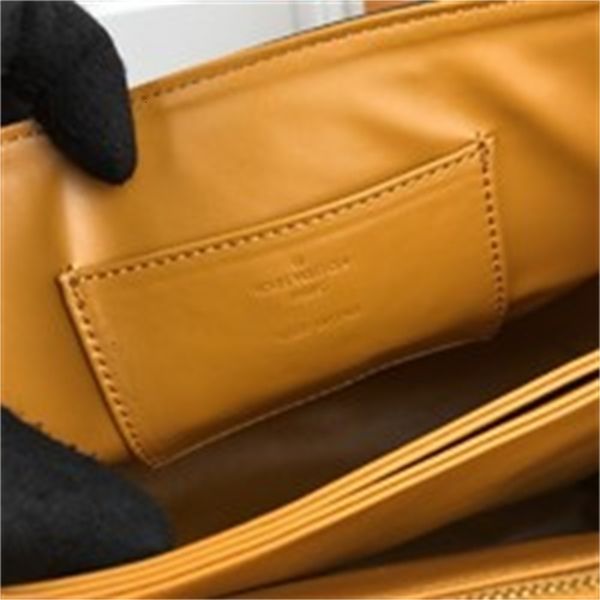 

padlocks brand designer luxury pzip a small gold. tote with a smooth, delicate silhouette and bloom elegant lines accented with with bright