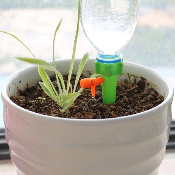 

watering equipments drip irrigation system plant waterers diy automatic water spikes taper plants houseplant