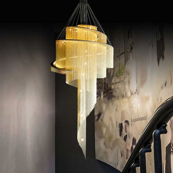 

post-modern duplex building large chandelier empty living room villa golden tassel spiral staircase light