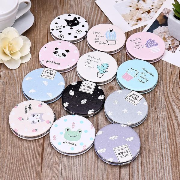

creative ladies makeup mirror portable folding gift double sided circle small beauty tool1