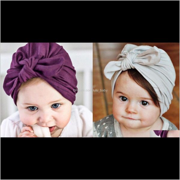 Moda 9 colori Cappelli per bambini Cappellini per orecchie da coniglio Turbante Nodo Copricapo Infantile Bambini India Cappelli Orecchie Copricapo Bambino Latte Seta Berretto T74Xi Sctbn