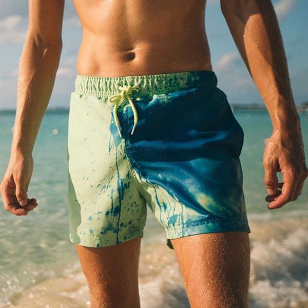 

2021 men's color changing beach bathing trunks in summer, White;black