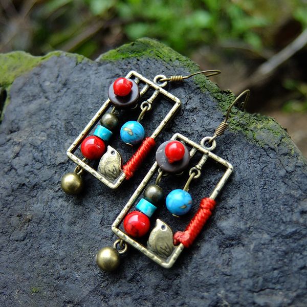

souvenir creative jewelry national style birdcage imitation pine stone coconut shell earrings no.1188