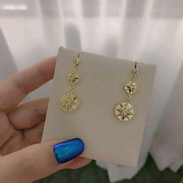 

high end d jia di compass six star white fritillaria earrings 925 sterling silver japanese and korean jewelry, Golden