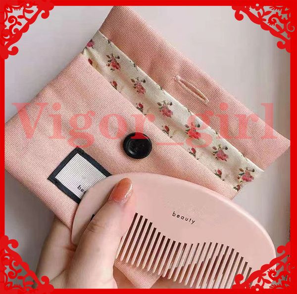 Designer-Haarbürsten, rosafarbener Holzkamm mit einem Taschen-Styling-Tool, Schönheitsprodukt für Mädchenhaare