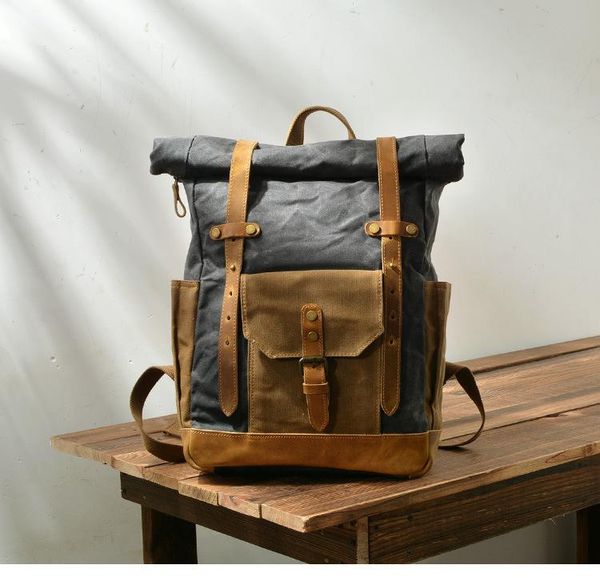 

backpack ,brand classic waterproof canvas backpack,vintage schoolbag.casual bag,big 18inch lapbackpack.leather bag.