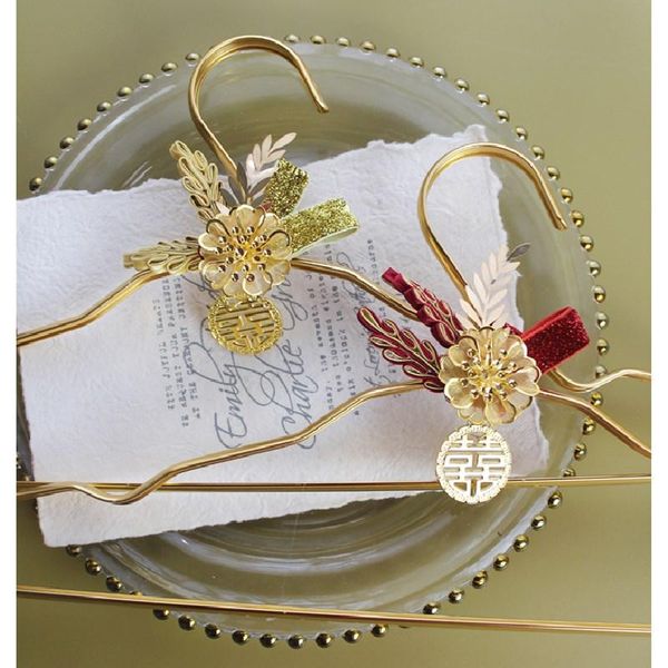 

1pc dress hanger pendant wedding groom bride bowknot korean chinese traditions flower stainless clothes stand home accessories hangers & rac
