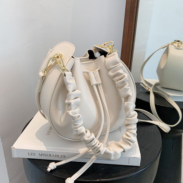 

female 2021 new fashion small round drawstring belt wrinkled cloud bag single shoulder messenger portable armpit bucket bag