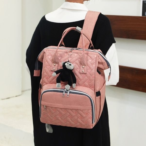 

new korean embroidered thread large capacity mommy bag outdoor double shoulder clip mouth single shoulder hand mother and baby