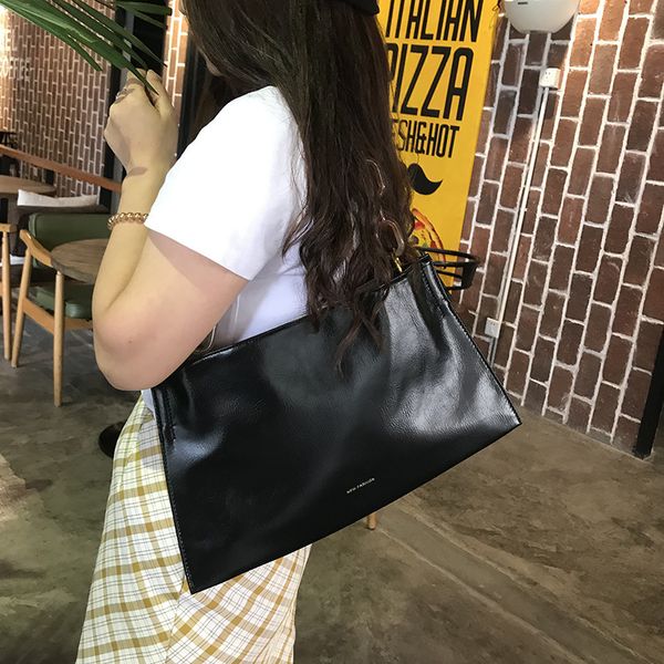 

2021 minority hand-held armpit bag fashion trend messenger single shoulder letter advanced chain women's