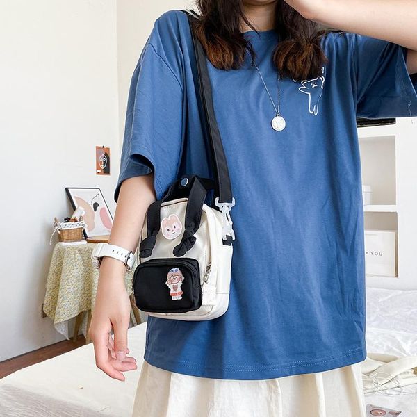 

shoulder bags japanese style, antique soft girl, cute cartoon student, casual and versatile, one bag, color contrast mini bag