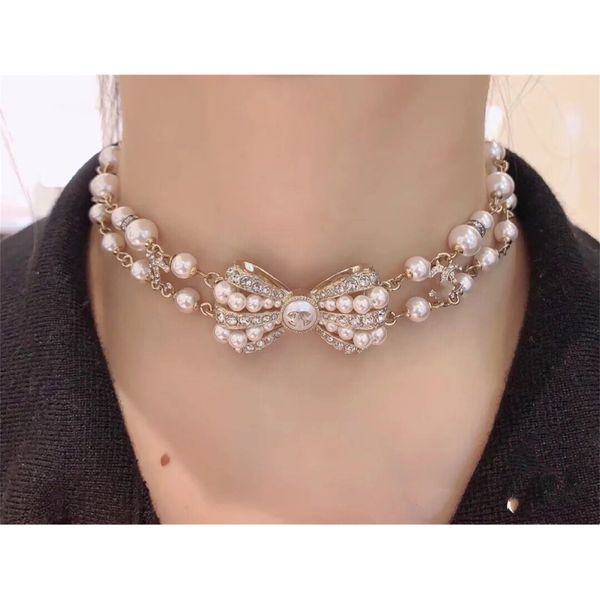

wind new style small fragrant pearl full diamond bow necklace femininity personality net red same style clavicle chainz, Silver