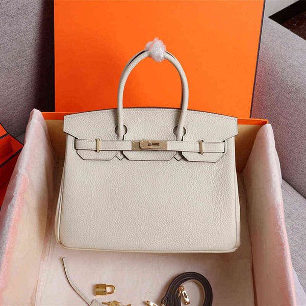 

designer handbags shoulder bag single of 2022 autumn winters in europe and the fashionable litchi grain zipper platinum lock hand by yyds
