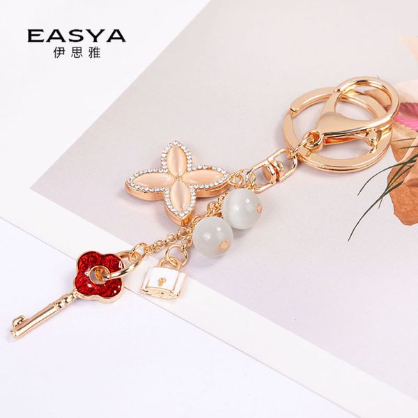 

new creative cat's eye four leaf clover key chain fashion pendant exquisite key chain bag car pendant, Black