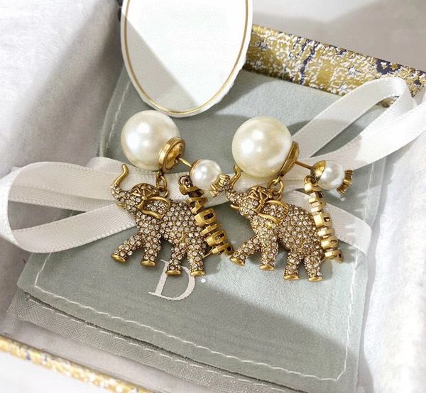 

design jewelry letter 2021 fashion new pearl single earrings small elephant full diamond earrings, Golden