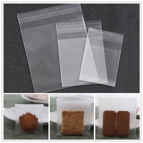 

100pcs/lot 4 sizes transparent cookie packaging bags self-adhesive plastic biscuit bag wedding candy gift wrap