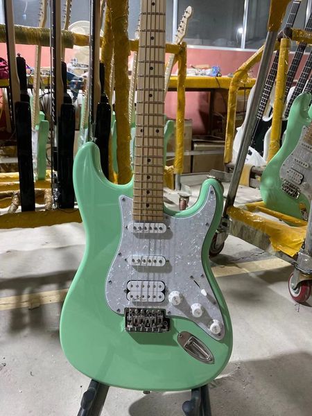 

electric guitar surf green maple fingerboard white pearl pickguard
