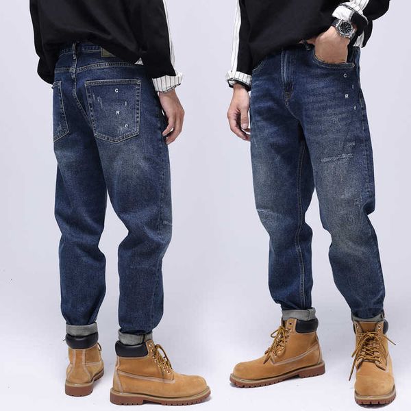 Jeans da uomo alla moda in stile street americano Pantaloni larghi in denim hip-hop strappati sfilacciati elastici blu retrò