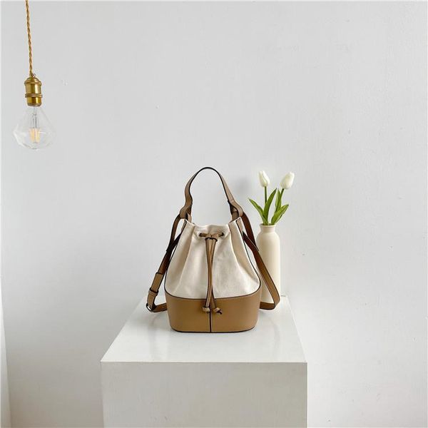 

evening bags korean style stitching canvas small bucket for women 2021 brand shoulder bag handbags casual tassel crossbody
