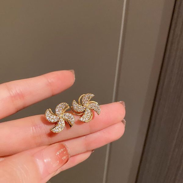 

stud windmill earrings female rotatable fashion personalized, Golden;silver