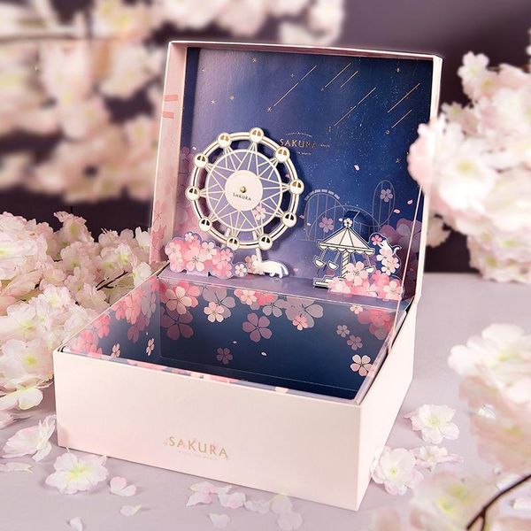 

gift wrap box with souvenir romantic skin care product for girlfriend