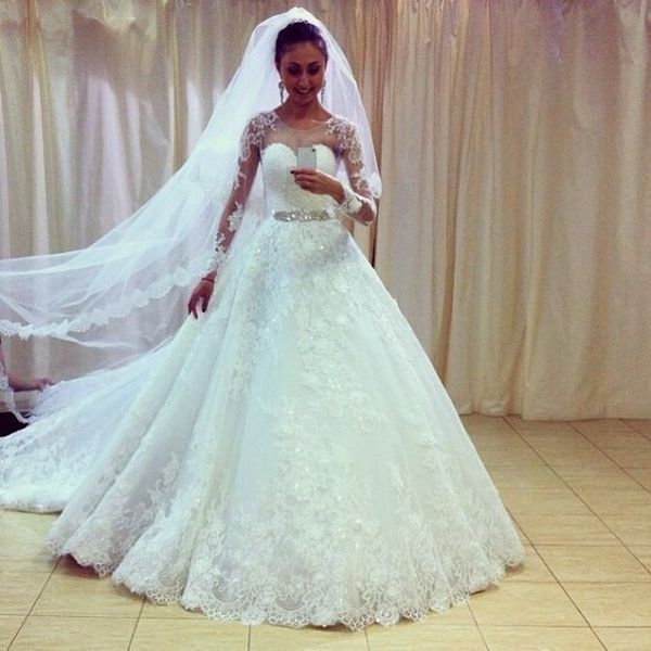 

luxury illusion wedding dresses with long sleeve a line vestidos de novia sparking sash arabic dubai modern bridal gowns, White